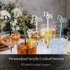 Personalized acrylic cocktail stirrers with 'D&S' branding in various glasses.